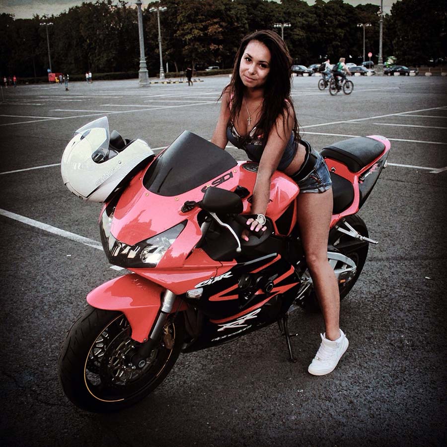 Brunettes on a motorcycle in Juian