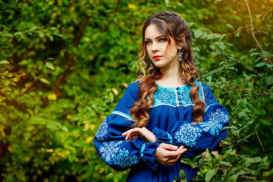 Sexy photo Women in Slavic costumes in Juian